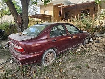 вмв капила: Nissan Almera: 1998 г., 1.4 л, Механика, Седан — 5
