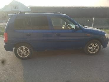 Mazda Demio: 2002 г., Механика, Бензин, Универсал