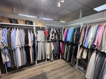 оборудование в бутик: Стеллажи для бутика одежды Кронштейны для бутика одежды Торговое — 17