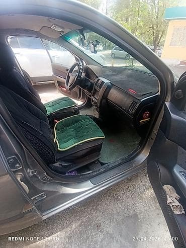 byd e3: Hyundai Getz: 2004 г., 1.4 л, Ручные, Бензин, Хэтчбэк — 5