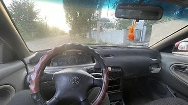 mazda 323 машина: Mazda Cronos: 1993 г., Бензин, Седан — 5