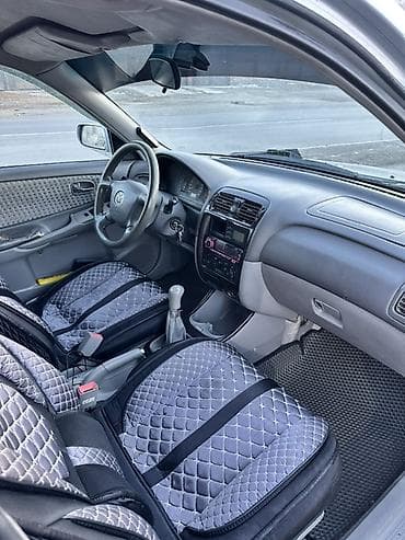 mazda 626 gc: Mazda 626: 2000 г., 2 л, Механика, Газ, Универсал — 10