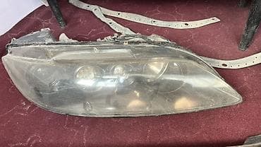 Передняя правая фара Mazda 2004 г., Оригинал, Япония