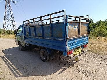 кпп портер 1: Hyundai Porter — компактный бортовой грузовик-самосвал малого — 7