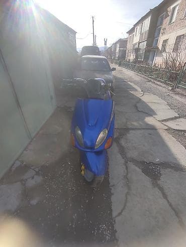 100 с3: Макси-скутер Yamaha, 125 куб. см, Бензин — 6