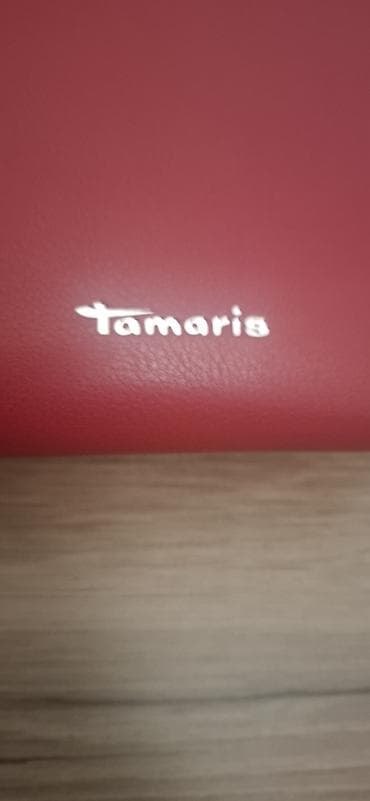 Сумка-кроссбоди Tamaris и сумка-клатч в стиле монограм Louis Vuitton