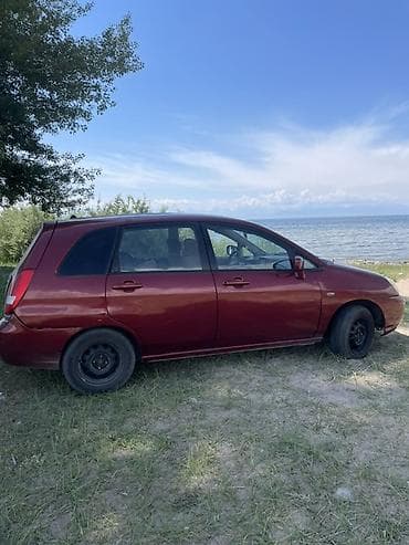 прозада авто: Suzuki Liana: 2001 г., 1.3 л, Механика, Бензин, Универсал — 2