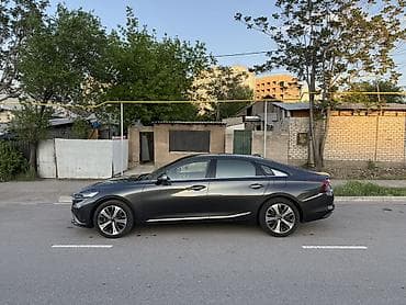 aion v: Kia K8: 2021 г., 1.6 л, Робот, Бензин, Фастбек — 2