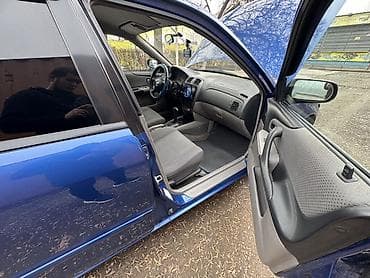 глушитель спортивный: Mazda 323: 2000 г., Хэтчбэк — 4