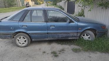 Унаа: Mitsubishi Lancer: 1990 г., 1.5 л, Кол менен иштөөчү, Бензин, Седан — 2