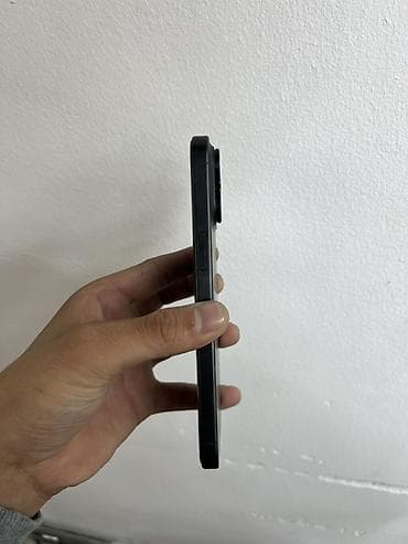 mac mini: IPhone 15 Pro, Black Titanium — 2