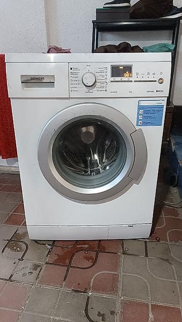 a 52: Чисто Германский стиральная машина Siemens front load, серия advantaq — 1