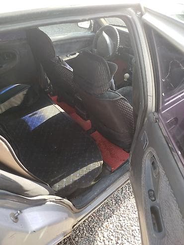 Daewoo Nexia: 2002 г., 1.5 л, Бензин, Седан