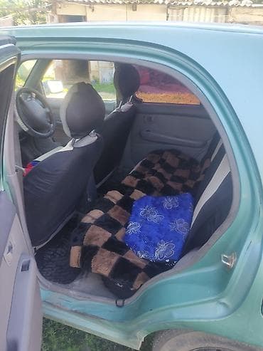 самый дешёвый авто: Nissan March: 2000 г., Автомат, Хэтчбэк — 2