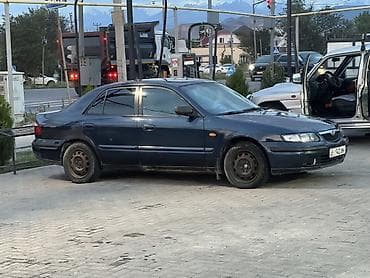 Унаа: Mazda 626: 1997 г., 1.8 л, Кол менен иштөөчү, Бензин, Седан — 3