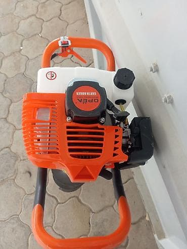 биндер: Бензиновый мотобур OPEA Earth Auger Описание: - Переносной мотобур — 2