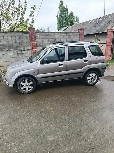 Suzuki Ignis: 2004 г., 1.5 л, Механика, Бензин, Кроссовер