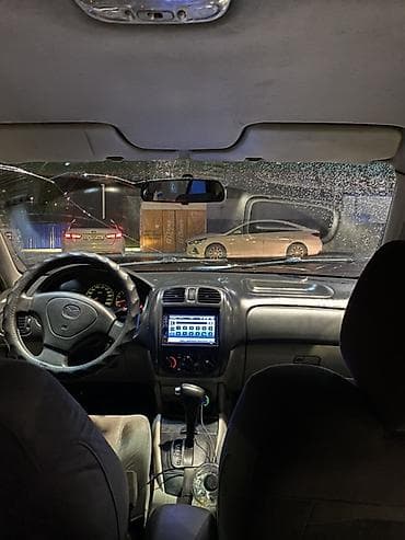 лампа керосиновая: Седан черного цвета, компактный и экономичный. Кузов 4-дверный — 7