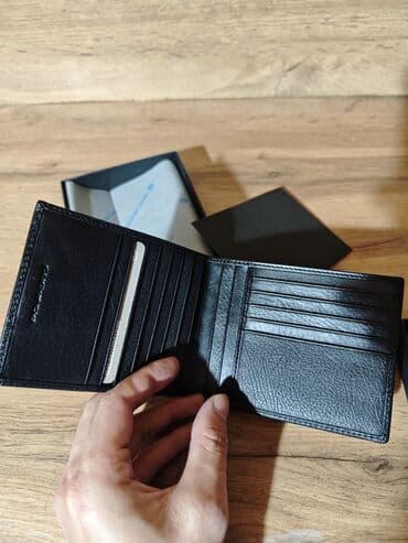 найден кошелек: Портмоне 
Натуральная кожа — 2