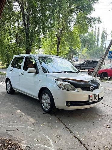 айни 95: Mazda Demio: 2005 г., 1.5 л, Автомат, Бензин — 4