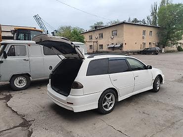 corolla e150: Универсал белого цвета, правый руль. Просторный кузов с большим — 2