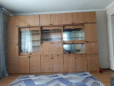 Эмерек: Стенка-гарнитур в гостиную из ДСП с отделкой под дерево. - — 2