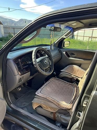 Mazda Tribute: 2002 г., 2 л, Механика, Бензин, Кроссовер — 5