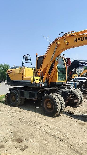 экскаваторы 140: Экскаватор, Hyundai, 2010 г., Колесный — 2