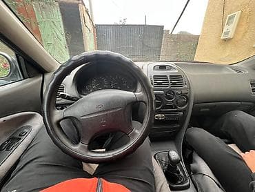 Mitsubishi: Mitsubishi Carisma: 1995 г., 1.8 л, Механика, Бензин, Хэтчбэк — 1