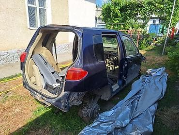 Кузов Mazda Demio 2003, темно‑синий, под разбор или как донор. Состав