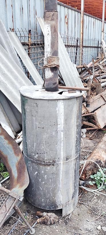 Самодельная печь-буржуйка из металлической бочки с дымоходом -