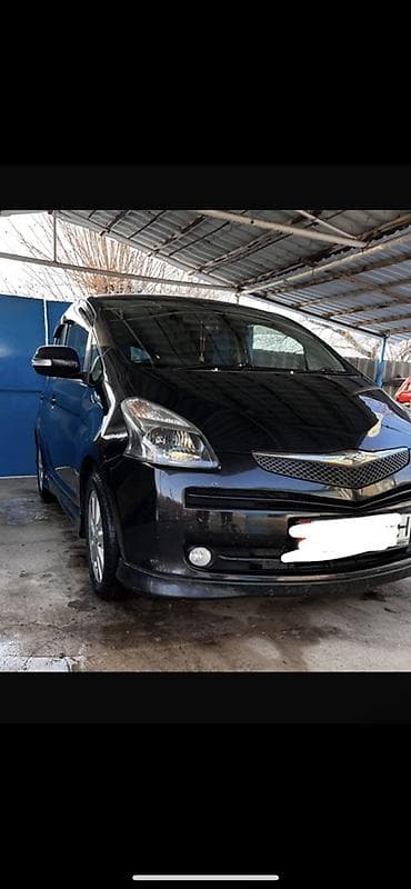 для такси авто: Toyota Ractis: 2005 г., Автомат — 1