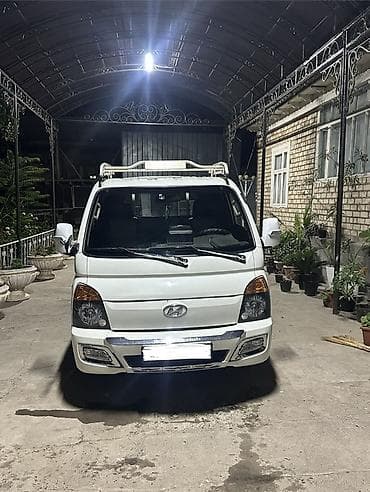 Hyundai Porter II (Porter 2) — компактный грузовой пикап с бортовой — 1