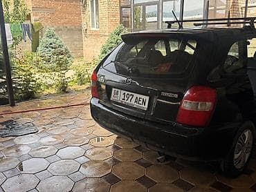 маш: Mazda 323: 2000 г., 1.6 л, Бензин, Хэтчбэк — 2