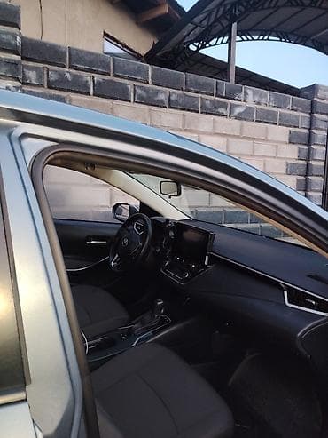 mitsubishi io: Toyota Corolla: 2021 г., 1.8 л, Вариатор, Гибрид, Седан — 6