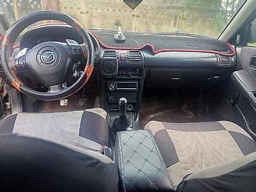 коса е34: Mazda 323: 1989 г., Хэтчбэк — 5