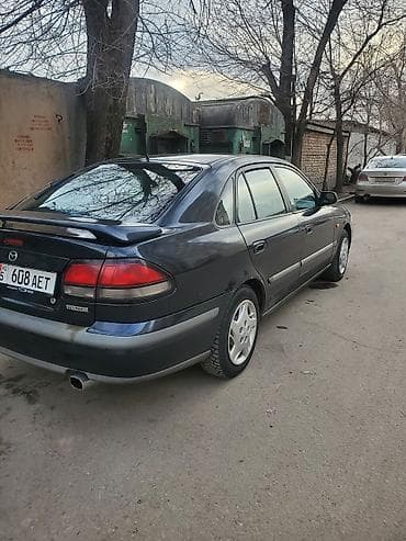 bmw e65: Mazda 626: 1997 г., 1.8 л, Механика, Бензин, Хэтчбэк — 3