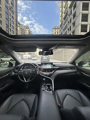 byd e2 2023: Toyota Camry: 2021 г., Гибрид, Седан — 7