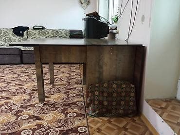 Раскладной стол-книга из ЛДСП под дерево. - Компактный: в сложенном