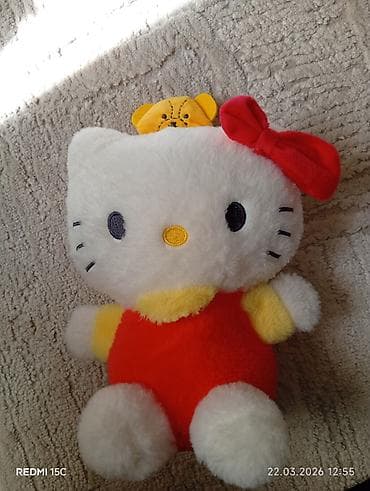 kitty: Мягкая игрушка «Hello Kitty» с бантом и медвежонком на голове. - — 1