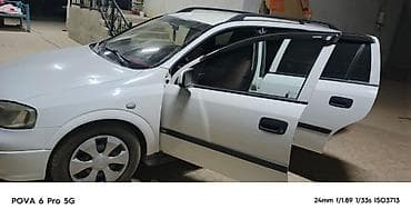 авто кроссовер: Opel Astra: 1999 г., Механика, Бензин, Универсал — 1