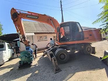 мини кран манипулятор: Экскаватор, Doosan, 2012 г., Колесный — 1