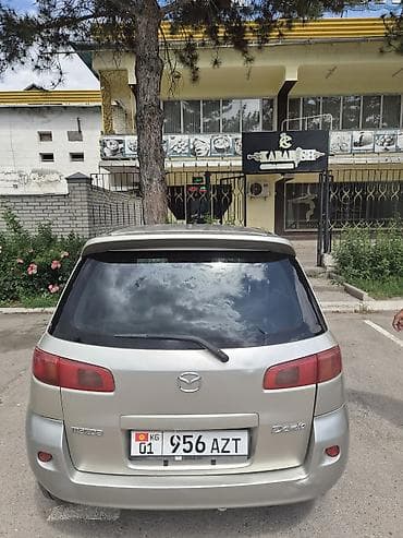 дириф кар: Mazda Demio: 2003 г., Хэтчбэк — 3