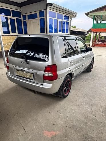 авто масла: Mazda Demio: 2001 г., 1.3 л, Автомат, Бензин, Хэтчбэк — 2