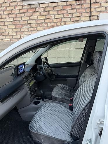 аскар авто: Mazda Demio: 2004 г., 1.3 л, Автомат, Бензин, Седан — 3