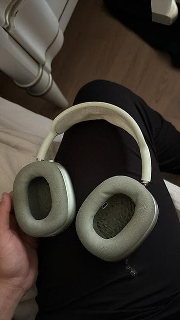 garmin fenix 8: Беспроводные накладные наушники в зеленом цвете с фирменным — 3