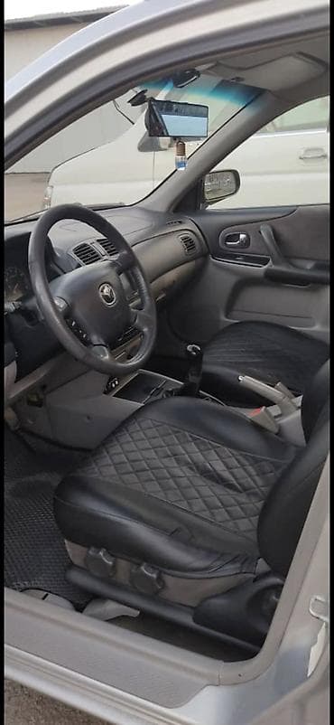 фиат сейченто: Mazda 323: 2003 г., 1.6 л, Механика, Бензин, Седан — 6