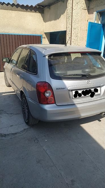 Mazda 323: 2002 г., 1.6 л, Кол менен иштөөчү, Бензин, Универсал