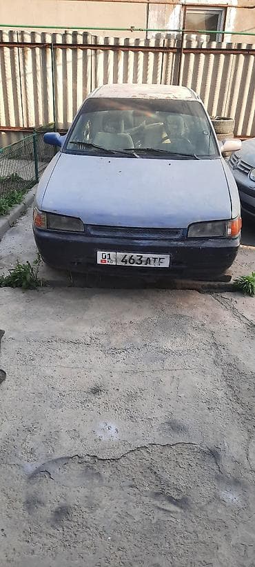 разный: Mazda Familia: 1990 г., 1.6 л, Механика, Бензин, Седан — 1