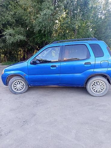 бюджетные авто: Продаётся компактный пятидверный кроссовер синего цвета. Основные — 3
